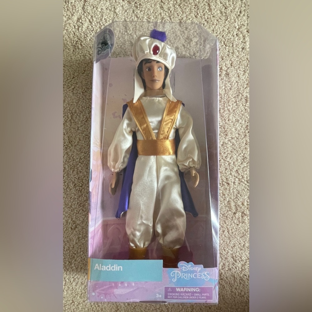 Disney store Aladdin 12” doll. New in box.